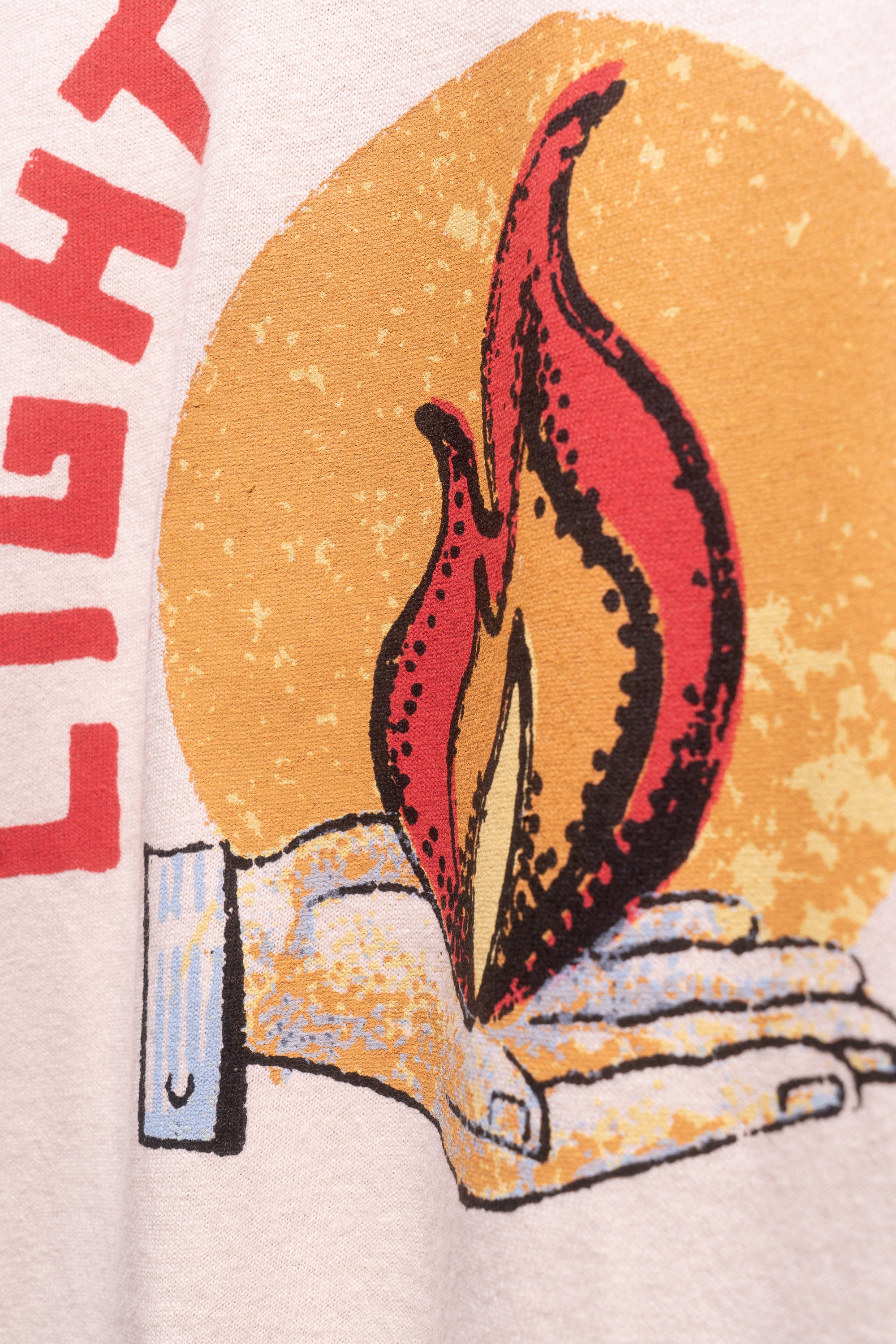 Zoomed in view of light catchers logo showing only center flame in a hand