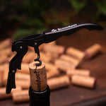 BloodRoot corkscrew opening bottle of wine