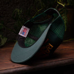 Inside view of green flat brim baseball hat