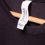 Bella Canvas tag inside BloodRoot t-shirt neck