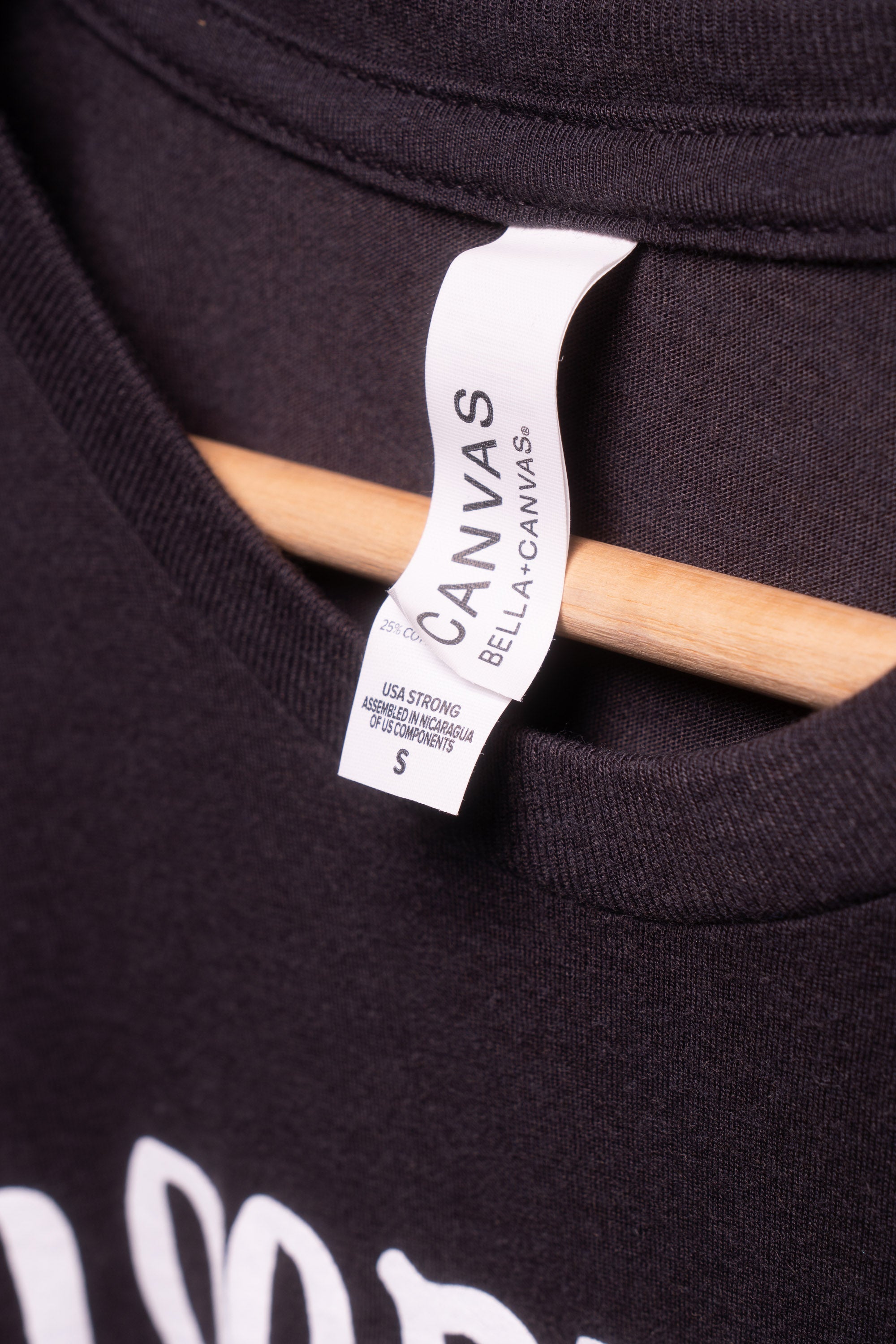 Bella Canvas tag inside BloodRoot t-shirt neck