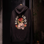 BloodRoot Skull and Roses design in white and red on the back of black hoodie