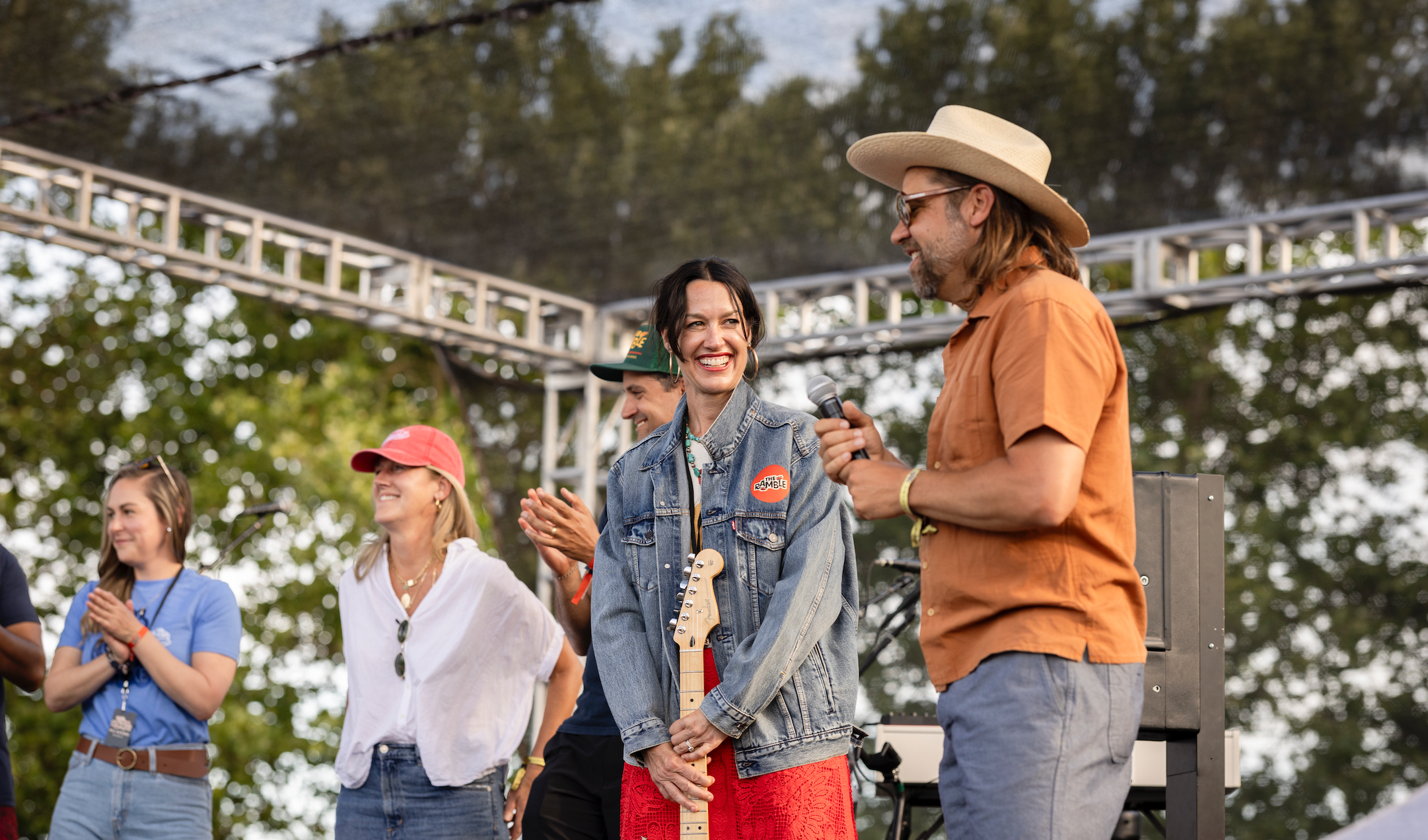 Owners of BloodRoot, Kelly and Noah Dorrance speak on stage at the Ramble